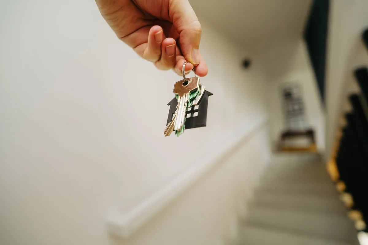 House keys handed over after a cash sale that stopped an Iowa foreclosure