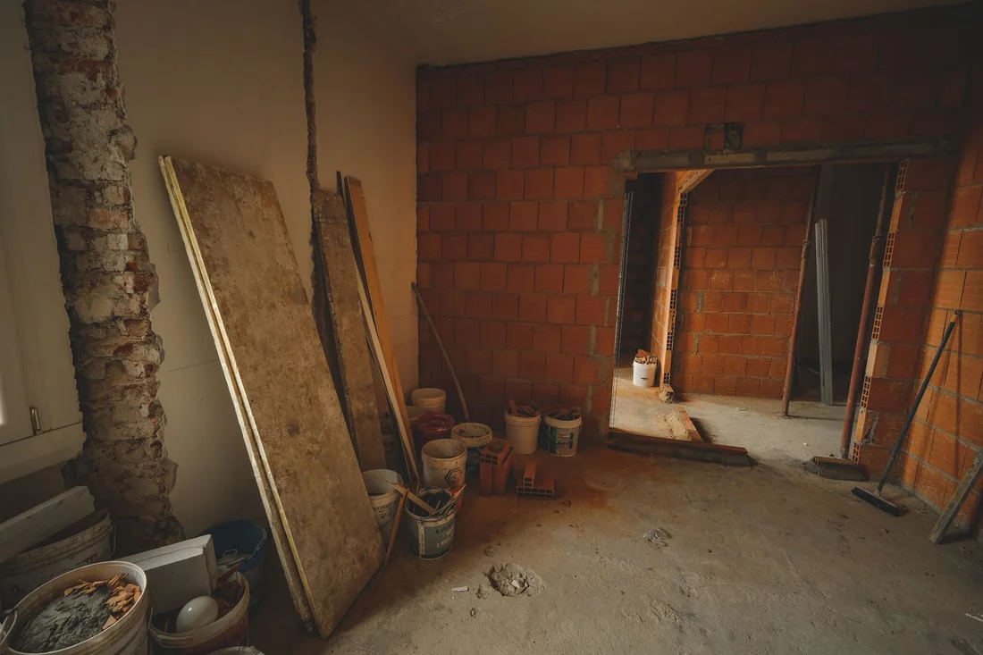 A house mid-renovation, the kind of contractor work that can lead to a mechanic's lien when selling a house in Iowa
