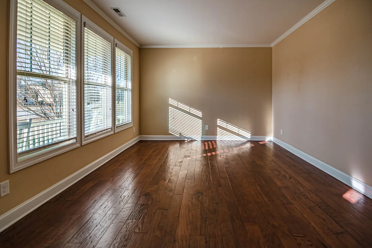 An empty living room in an older home, representing exceptions to Medicaid estate recovery for a surviving family member