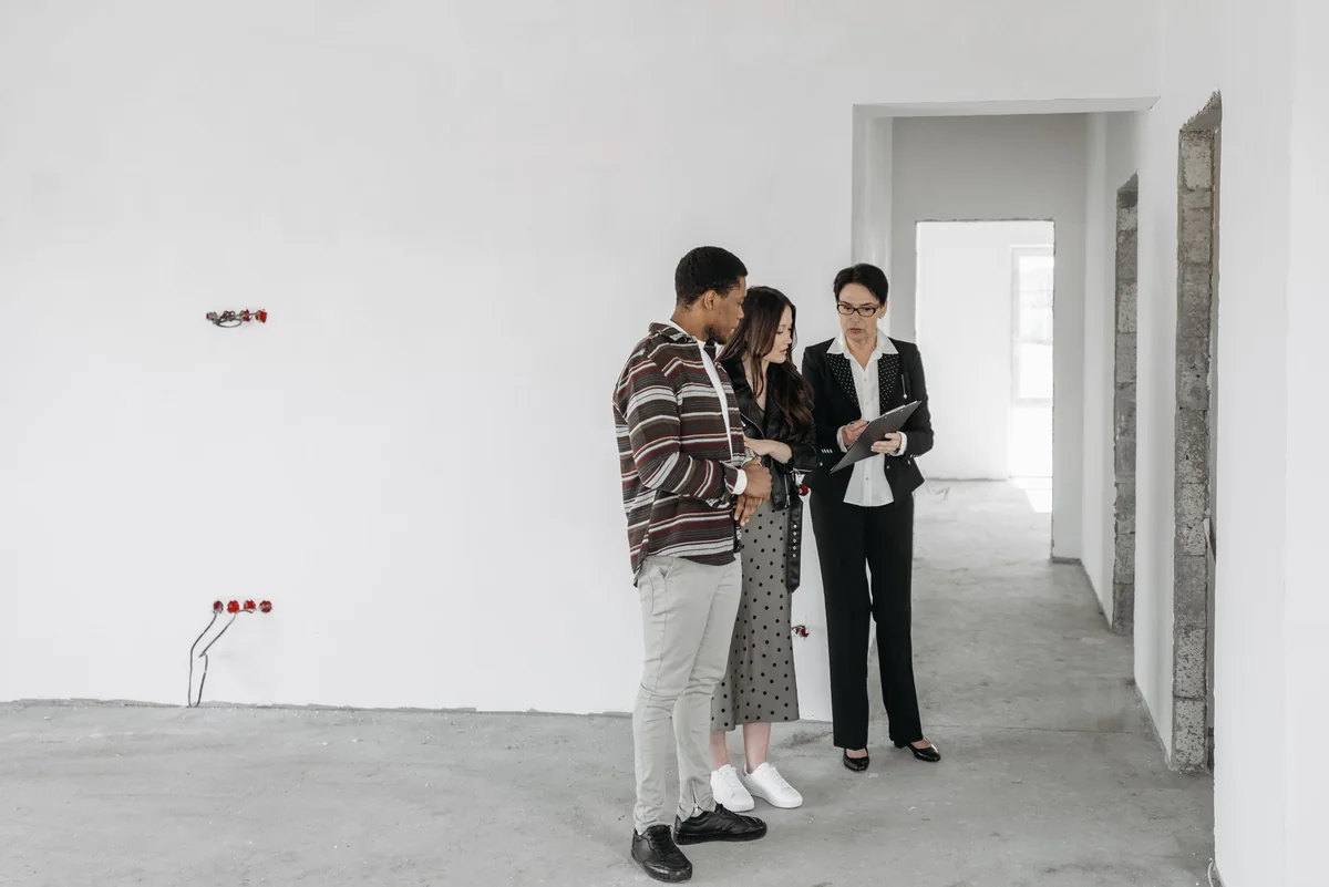 A couple reviewing rental paperwork to understand depreciation recapture