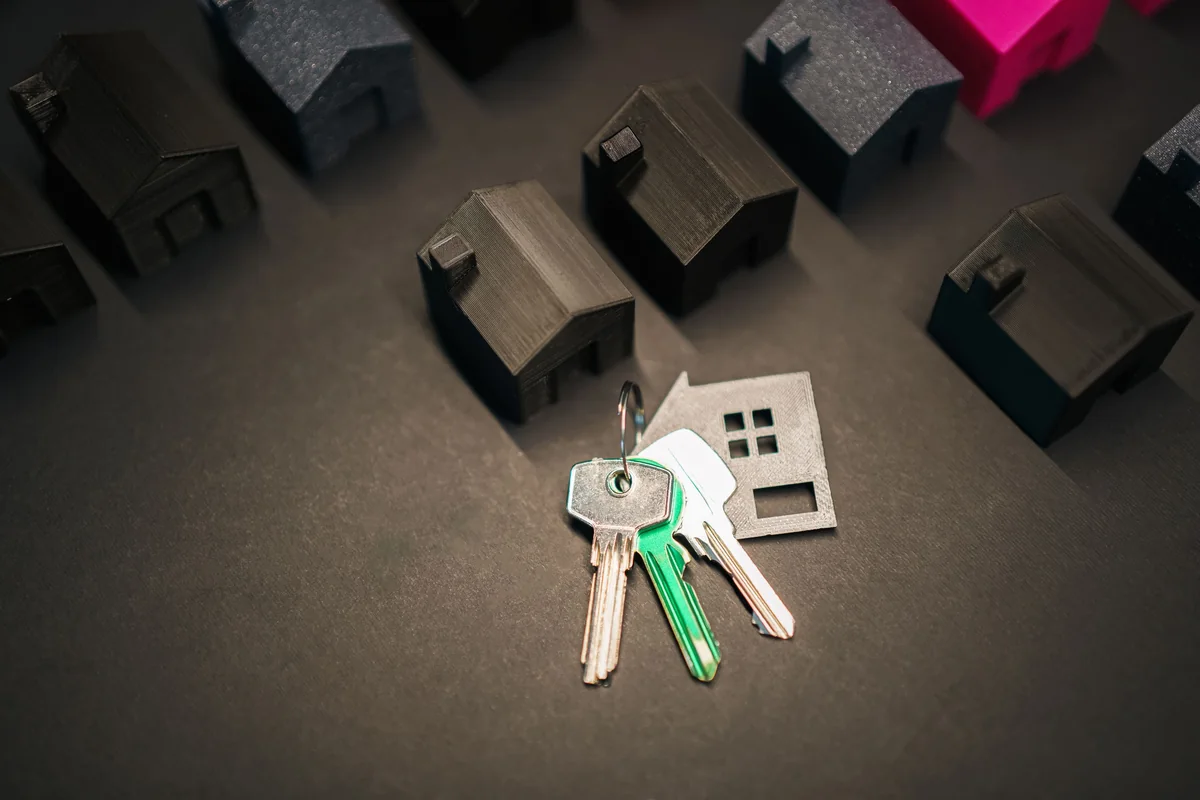 House keys representing each heir's ownership share of an inherited Iowa home